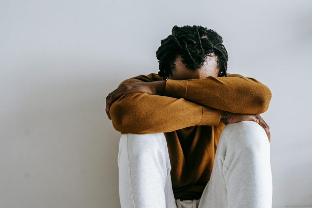 a man crouched down